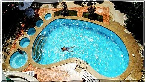 Foot-shaped swimming pool